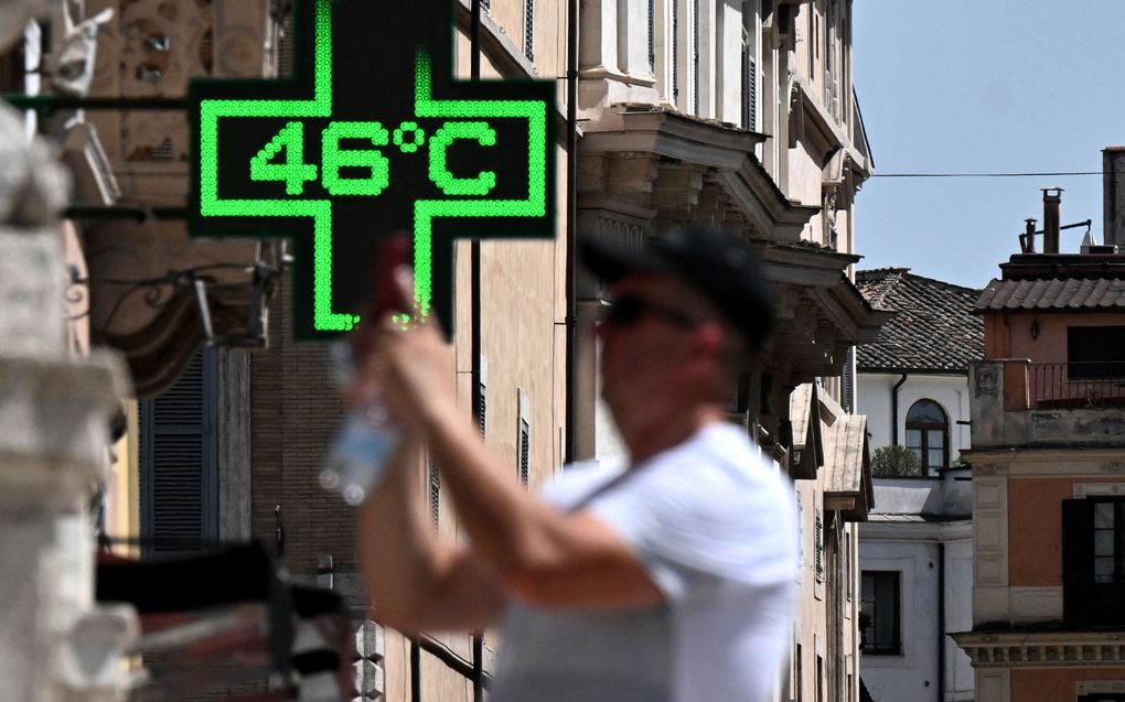 Een bord met de temperatuur in Rome. beeld FABI / AFP, Tiziana