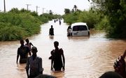 „Na een overstroming in Afrika moet alles na een jaar weer op orde zijn. Maar in Nederland trekken we gerust vijftien jaar uit voor een eenvoudige wijkvernieuwing.” beeld AFP, Ebrahim Hamid