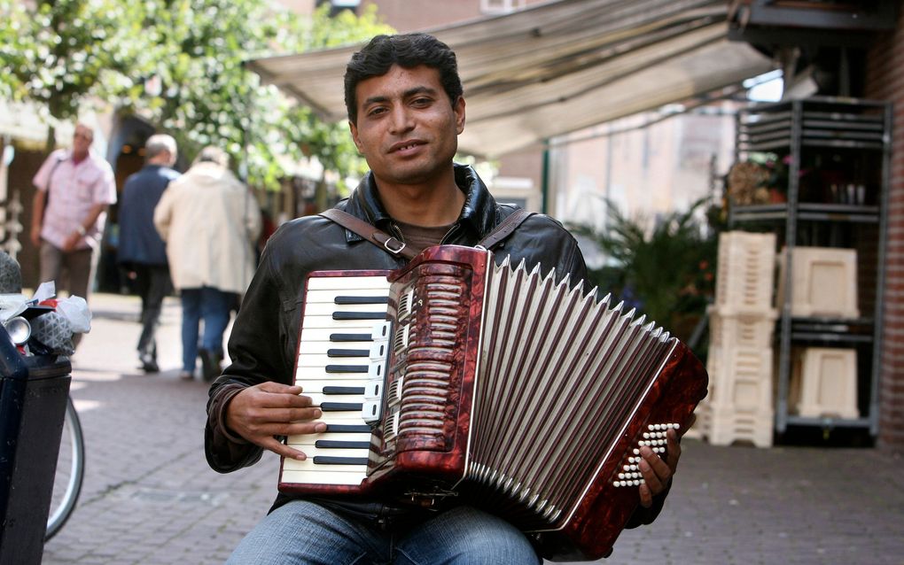 Straatmuzikant. Foto RD, Anton Dommerholt