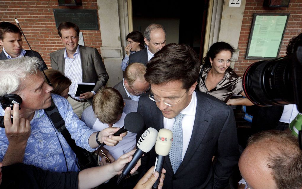 DEN HAAG - Mark Rutte staat de pers te woord na afloop van het gesprek met informateur Herman Tjeenk Willink. De onderhandelingen over een paars-pluskabinet van VVD, PvdA, D66 en GroenLinks kunnen maandag beginnen. Foto ANP