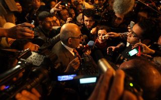 Mohamed ElBaradei komt aan in Caïro. Foto EPA