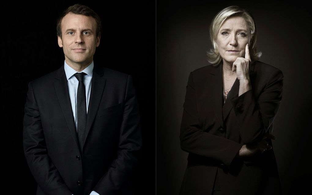 Macron (L) en Le Pen. beeld AFP