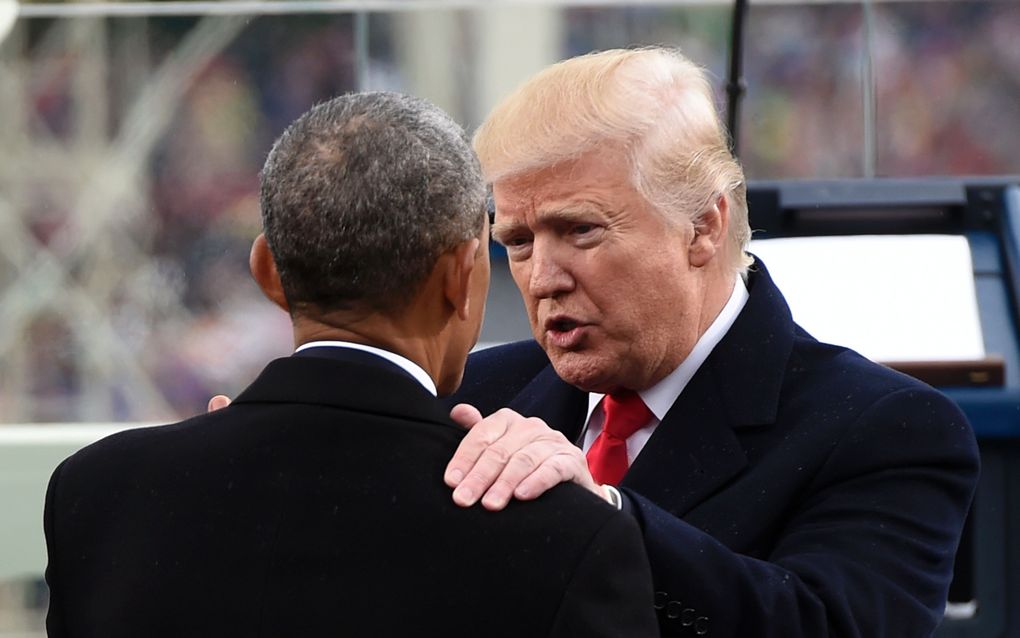 Trump en Obama. beeld AFP