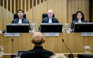 De rechtbank onder leiding van voorzitter H. Steenhuis (M) voorafgaand aan de uitspraak in het omvangrijke strafproces over het neerhalen van vlucht MH17. Vier mannen worden vervolgd voor betrokkenheid bij de ramp die alle inzittenden het leven heeft gekost. beeld ANP, Remko de Waal