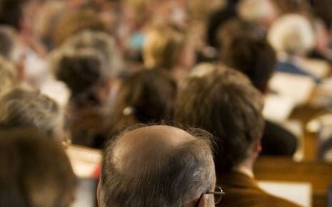 Het gaat erom dat de gemeente die dag samenkomt. Foto ANP