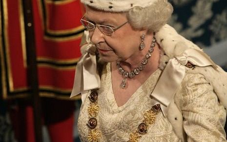 De Britse vorstin Elizabeth II woensdag op weg naar Westminster Palace. Foto EPA