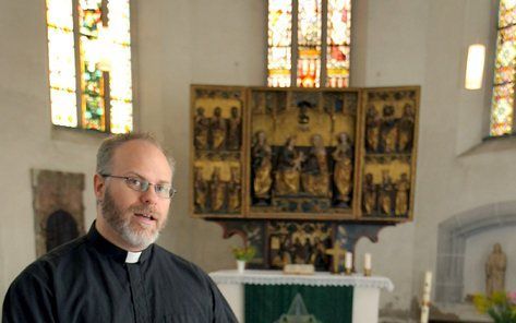 EISLEBEN - Het doopvont in de kerk waar de reformator Maarten Luther gedoopt is. Foto EPA