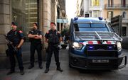 Catalaanse politie in Barcelona, zaterdag. beeld AFP