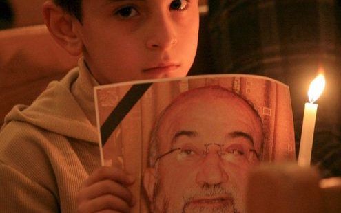 Christenen uit het Noord-Iraakse Irbil herdachten donderdagavond in een dienst de overleden aartsbisschop Paulos Faraj Rahho. Foto EPA