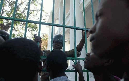 De internationale gemeenschap moet niet langer toekijken hoe de situatie in HaÃ¯ti escaleert.