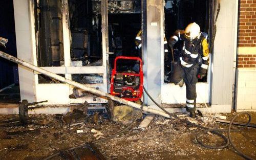 MAASTRICHT - Door een brand in een winkel in tweedehandskleding in Maastricht zijn in de nacht van donderdag op vrijdag acht mensen gewond geraakt, van wie een ernstig. De brand is vermoedelijk aangestoken, aldus de politie. Foto ANP