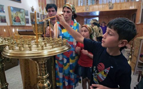 MOSKOU â€“ De christelijke minderheid in Rusland heeft het niet gemakkelijk. Volgens een Russische godsdienstwe tenschapper is dit mede te danken aan de opstelling van de Russisch Orthodoxe Kerk. Foto EPA