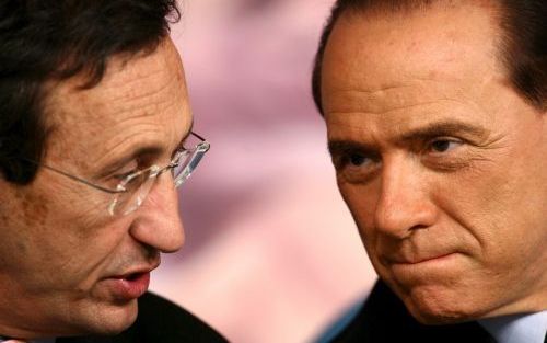 ROME - De Italiaanse premier Silvio Berlusconi (rechts) en minister van Buitenlandse Zaken Gianfranco Fini dinsdagavond tijdens een persconferentie. Foto EPA