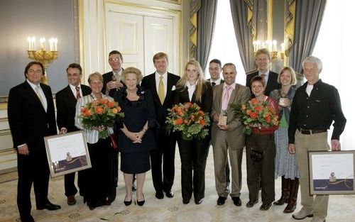 Prins Willem-Alexander reikte dinsdag de Appeltjes van Oranje uit. Foto ANP