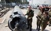 Een Iraanse ballistische raket wordt geïnspecteerd door Israëlische militairen. beeld AFP, Gil Cohen-Magen GIL 