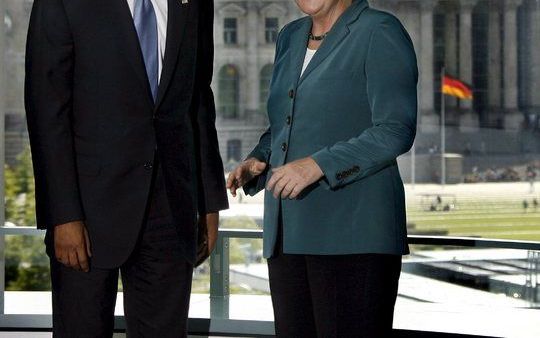 Obama en Merkel voor de Rijksdag in Berlijn. Foto EPA