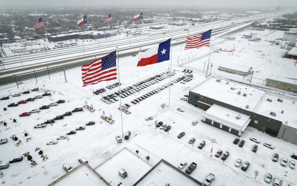 Irving, Texas. Een winterstorm bedekt een groot deel van Texas met sneeuw en ijzel. beeld AFP, John Moore