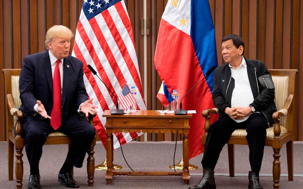 Trump en Duterte. beeld AFP