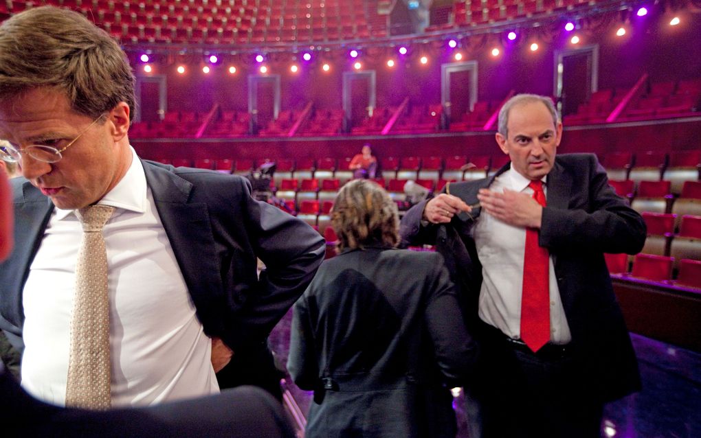 UTRECHT - Met nog vier dagen tot de verkiezingen gaat PvdA-leider Cohen (r.) vol in de aanval op VVD-leider Rutte (l.). Foto ANP