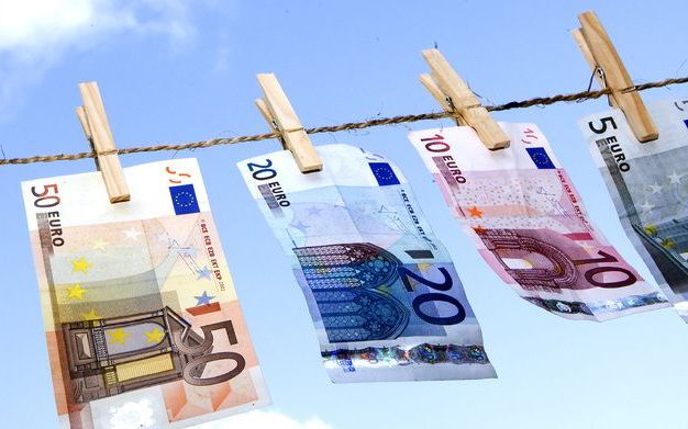 De meeste Denen zijn door de internationale financiële crisis en het effect daarvan op de rentetarieven in Denemarken nu wel voorstander van de euro. Foto ANP