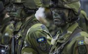 Zweedse soldaten tijdens een oefening. beeld AFP, Jonathan Nackstrand