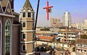 Dit kruis werd in december 2014 verwijderd van een kerk in Jiachi, in de provincie Zhejiang. beeld China Aid