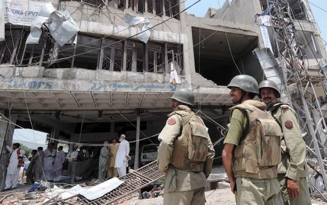 Het verwoeste politiebureau in Lahore. foto EPA