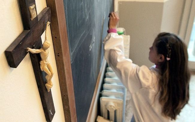 Kruisbeeld in een klaslokaal in het Italiaanse Pisa. Foto EPA