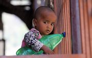 Jonge vluchteling uit Myanmar. beeld EPA