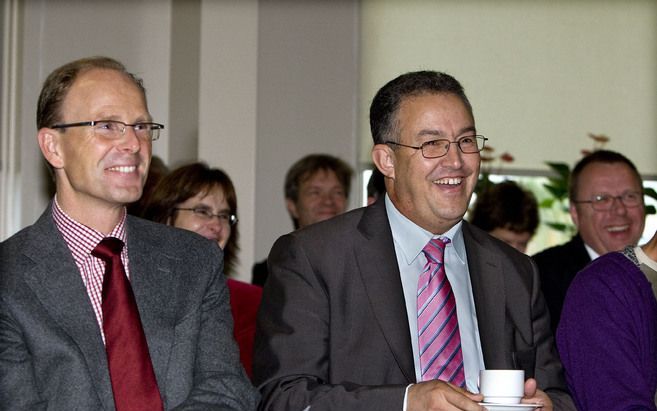 Schrijer (links) zal de functie van Aboutaleb (rechts) als wethouder van Sociale Zaken niet overnemen. Foto ANP