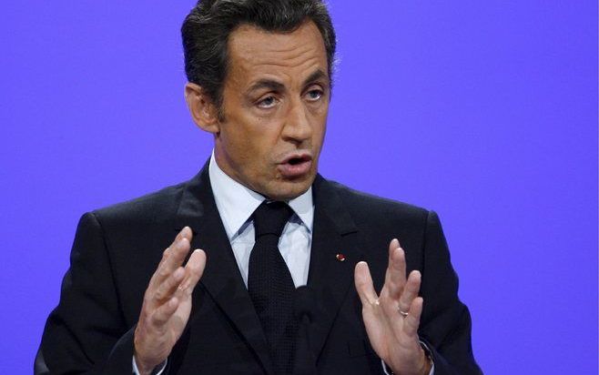 De sector moet worden gered van de afgrond, aldus Sarkozy woensdag bij de aankondiging van de top. Foto EPA