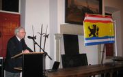 TERNEUZEN - De onthulling van de vlag tijdens de nieuwjaarsreceptie van de gemeente Sluis. Foto RD