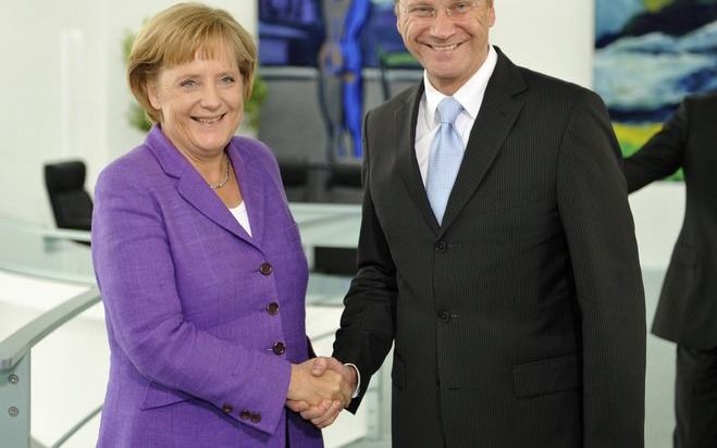 De vrijwel unanieme steun voor Westerwelle geeft hem een sterkere positie in de komende coalitieonderhandelingen met de CDU/CSU van Angela Merkel.Foto EPA