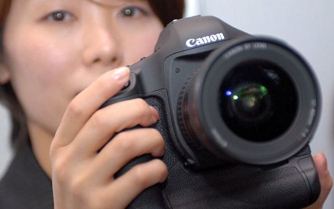 Canon ziet nog wel een solide vraag naar zijn geavanceerde camera’s. Foto EPA