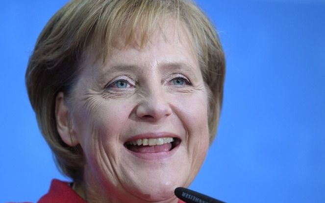 BERLIJN - Angela Merkel (55) heeft haar doel bereikt. Zij kan regeren met de liberale FDP en de ’grote’ coalitie met de sociaaldemocratische SPD vaarwel zeggen. Heel haar campagne richtte zich daarop. Foto EPA