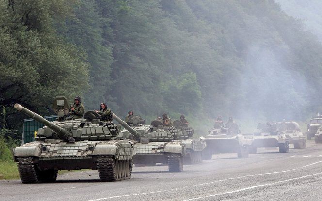 „In de toekomst zal Rusland zijn machtspolitiek voortzetten en een assertievere rol gaan spelen.” Foto: Russische tanks tijdens de inval in augustus in Georgië. Foto EPA