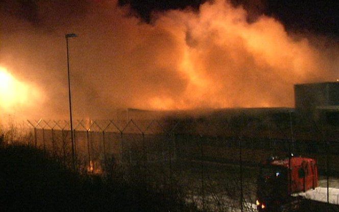 Brand in het cellencomplex van Schiphol, oktober 2005. Foto ANP