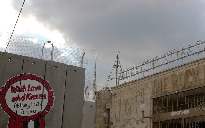 Bethlehem viert Kerst achter de veiligheidsbarrière. - Foto’s Alfred Muller