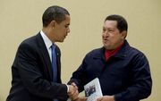 Obama en Chavez. Foto EPA