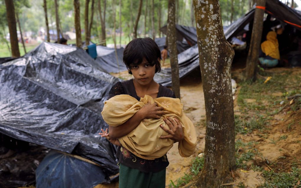 De Rohingya proberen op grote schaal buurland Bangladesh te bereiken, maar dat staat niet te trappelen om ze op te nemen. beeld AFP