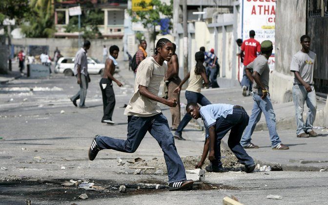 Rellen in de straten van Port–au–Prince. Foto EPA