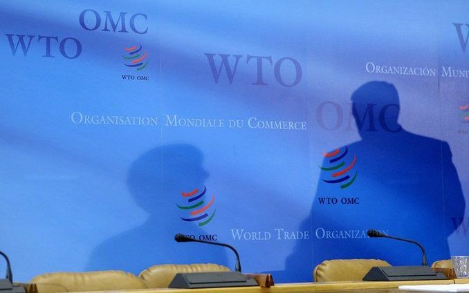 Schaduwen van onderhandelaars op de WTO-top in Geneve. Foto EPA