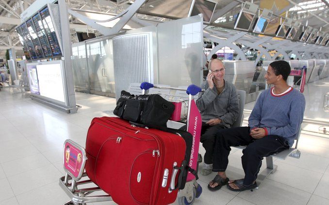 Bij de Nederlandse ambassade in Bangkok hebben zich tot nu 106 Nederlanders gemeld die het land door de noodtoestand niet kunnen verlaten. Foto EPA