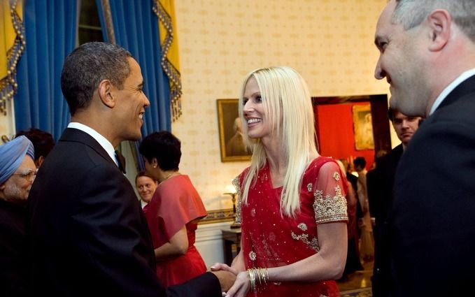 Tareq en Michaele Salahi schudden Obama de hand. Foto EPA