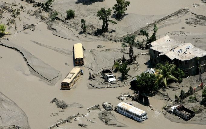 Orkanen, aardbevingen, overstromingen en andere natuurrampen hebben in 2008 wereldwijd aan 235.736 mensen het leven gekost. Foto EPA