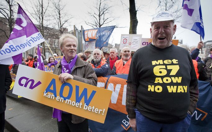 Actievoerders van CNV en FNV. Foto ANP