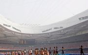 Het nationale stadion van Peking, ook wel het Vogelnest, is klaar voor de opening van de Spelen. Foto EPA