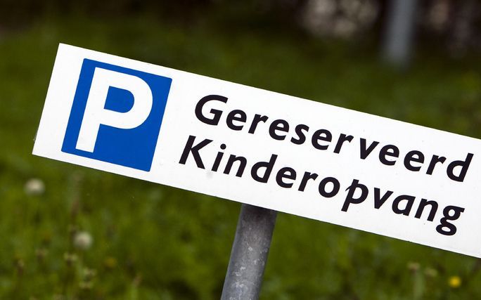 Veel ouders denken minder te gaan werken als de vergoedingen voor gastouders verlaagd zullen worden. Foto ANP