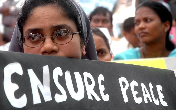 Indiase christenen protesteren tegen het geweld tegen christenen in de Indiase deelstaat Orissa. Foto EPA