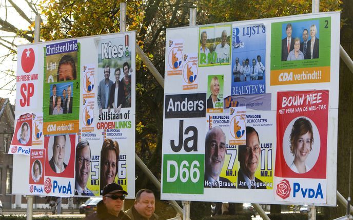 Ook op dit verkiezingsbord in Venlo staat CU en CDA dicht bij elkaar. Foto ANP.